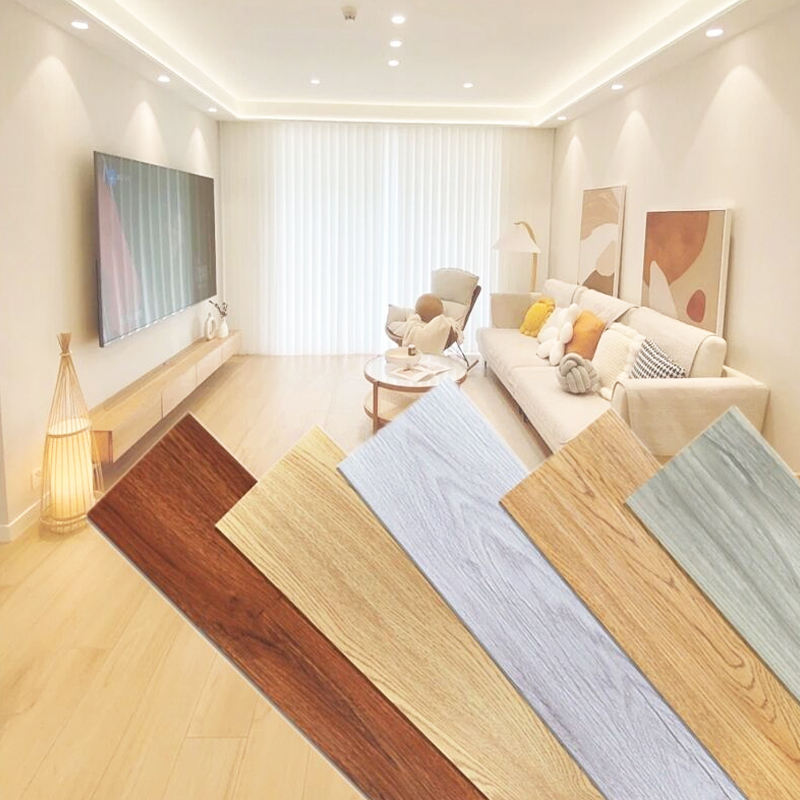 Phòng khách hiện đại với sàn gỗ nhiều màu, sofa trắng, tranh tường và đèn trang trí.