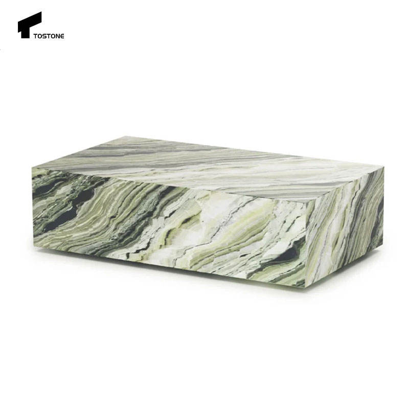 Khối đá chữ nhật màu xanh trắng với vân sóng tự nhiên trên nền trắng.