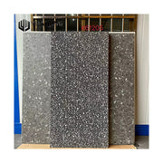Ba tấm gạch hoa văn đá xám, trắng, và đen, với họa tiết terrazzo nổi bật.