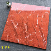 Gạch marble đỏ với vân trắng, đặt trên nền xám. Cây nhỏ ở góc trên bên trái.