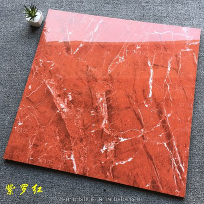Gạch marble đỏ với vân trắng, đặt trên nền xám. Cây nhỏ ở góc trên bên trái.