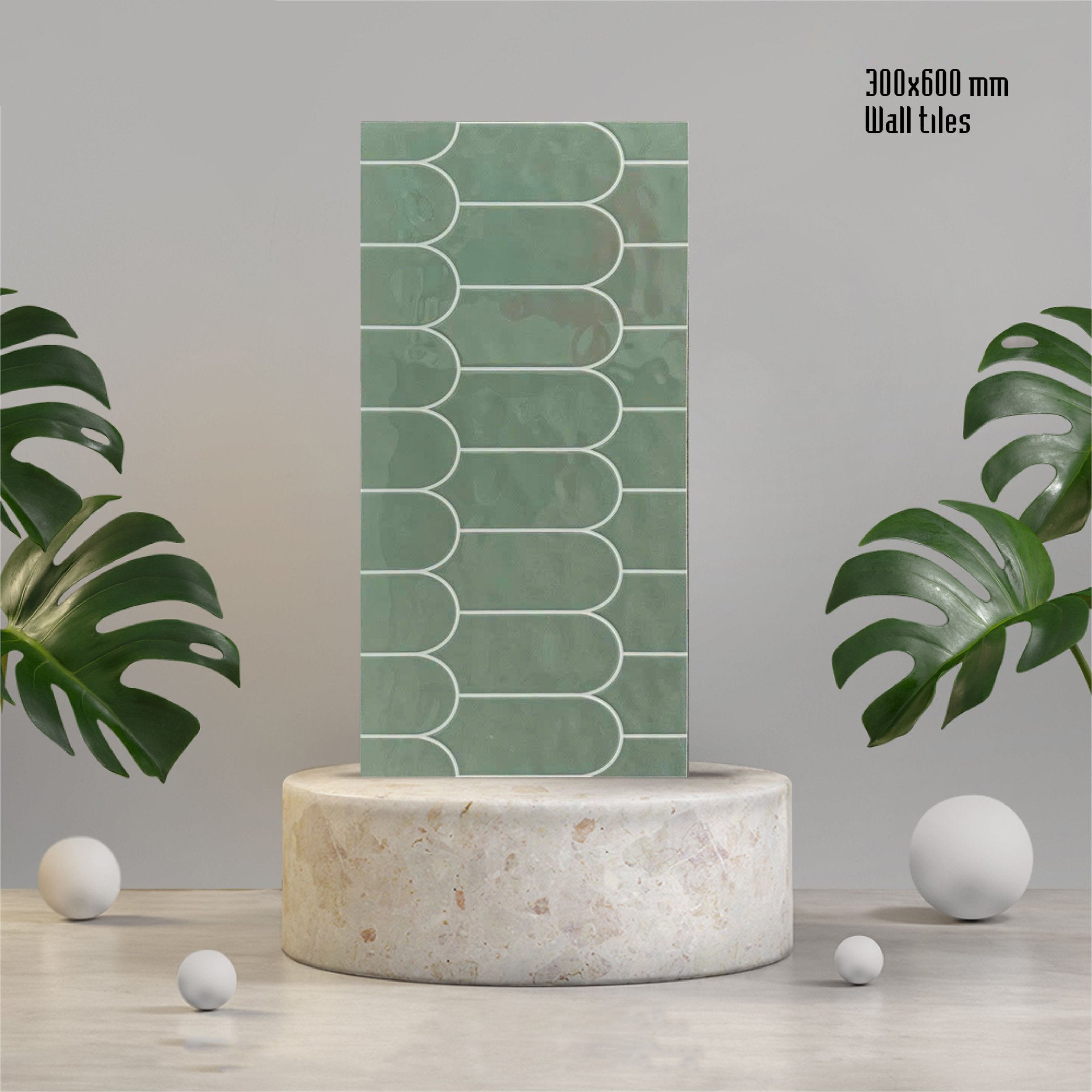 Gạch ốp tường xanh lá 300x600mm, họa tiết hình vòm, nền xám, kèm lá cây trang trí.