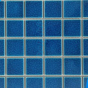 Các viên gạch vuông nhỏ màu xanh dương đậm xếp thành lưới, đường kẻ màu sáng.