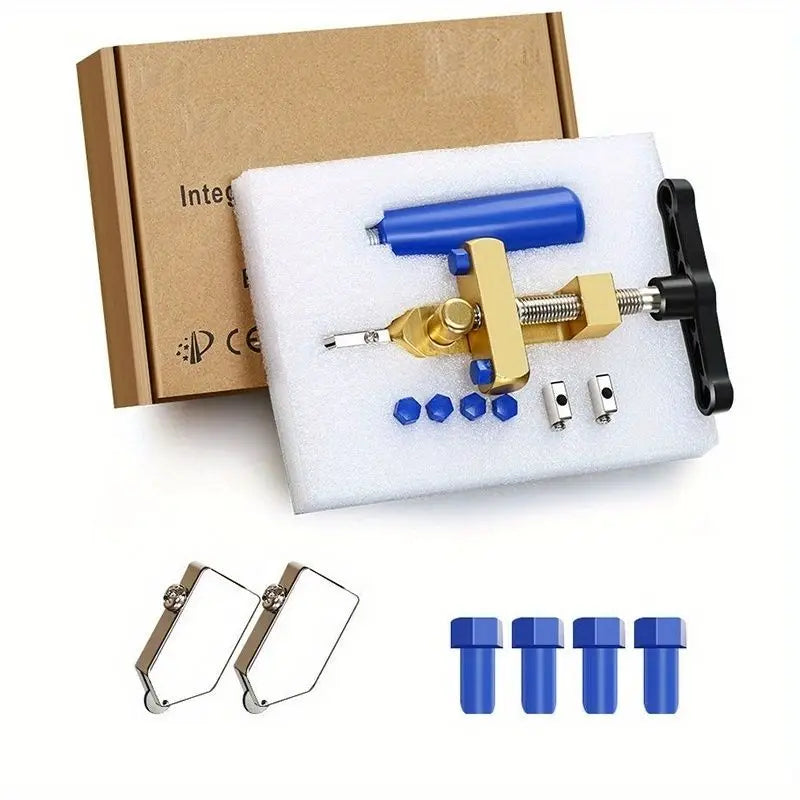 Bộ dụng cụ sửa chữa với chi tiết vàng, xanh, và hộp carton nâu, kèm phụ kiện nhỏ màu xanh.
