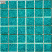 Gạch vuông màu xanh ngọc, bề mặt có kết cấu, sắp xếp thành lưới 6x6.